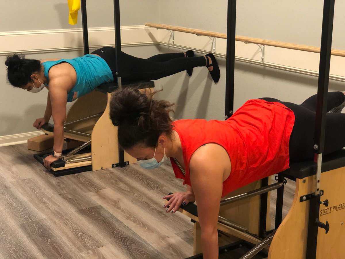 Pilates chair scapular mobilization exercise at Synergy Pilates Round Rock, Texas